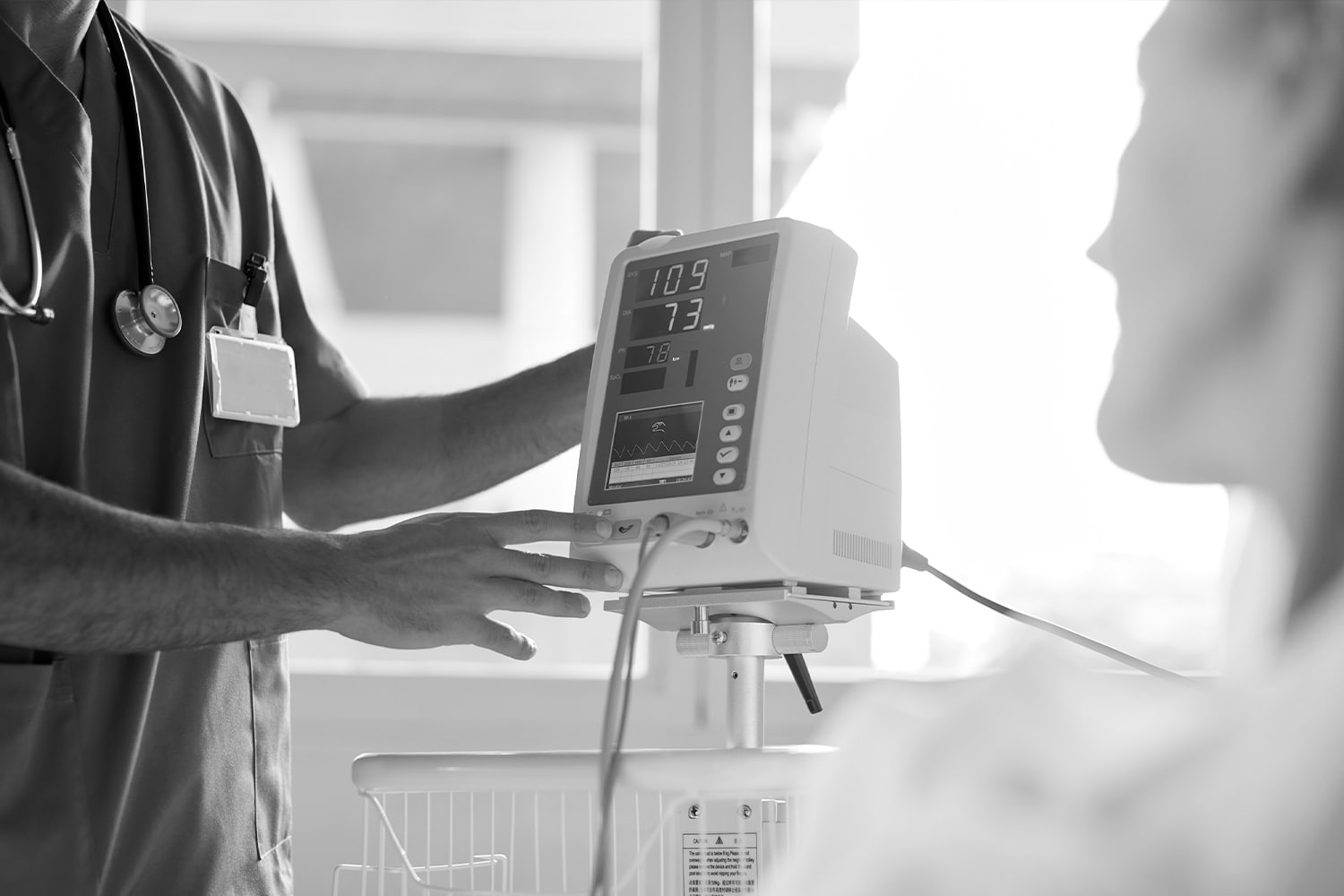 Doctor checking a patient's EKG