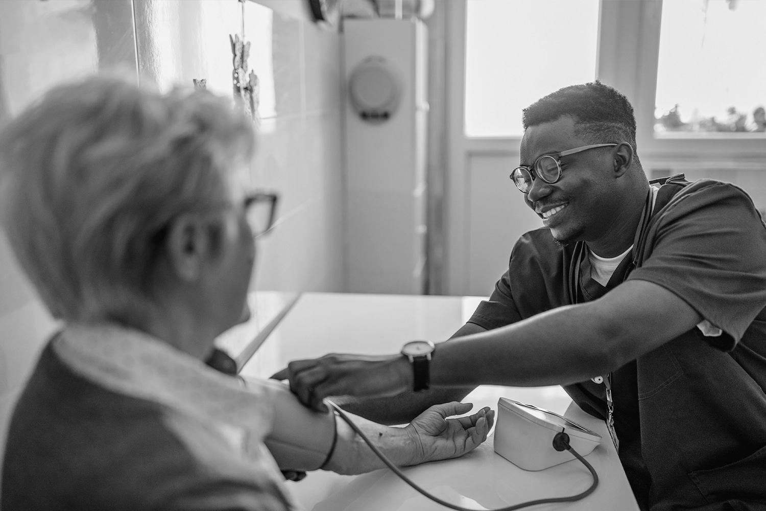 Nurse checking a patient's vitals